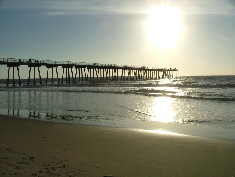 Sun hitting the Redondo Beach pier, California
