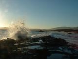 Water crashing over rocks on the coast. Water crashing over rocks on the coast.