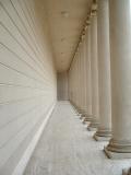 Jo peaking out from behind some columns, at the Palace of the Legion of Honour, San Francisco