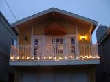The front of our house with Christmas lights in efect, Christmas day.