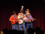 Billy Hill & the Hillbillies play each other's instruments, Disneyland, California