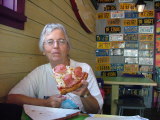 Jo's Mum enjoying pizza by the slice at Pizza Oom Mow Mow, Disney's California Adventure, California
